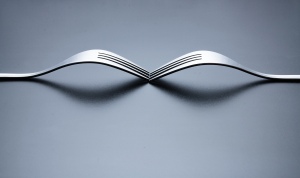 Cutlery on a plate with soft light, on sale for stock photography sites.